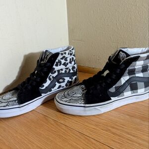 Vans Women's Black and White High-Top Sneakers